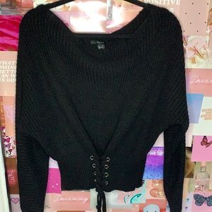 Lower corset styled sweater